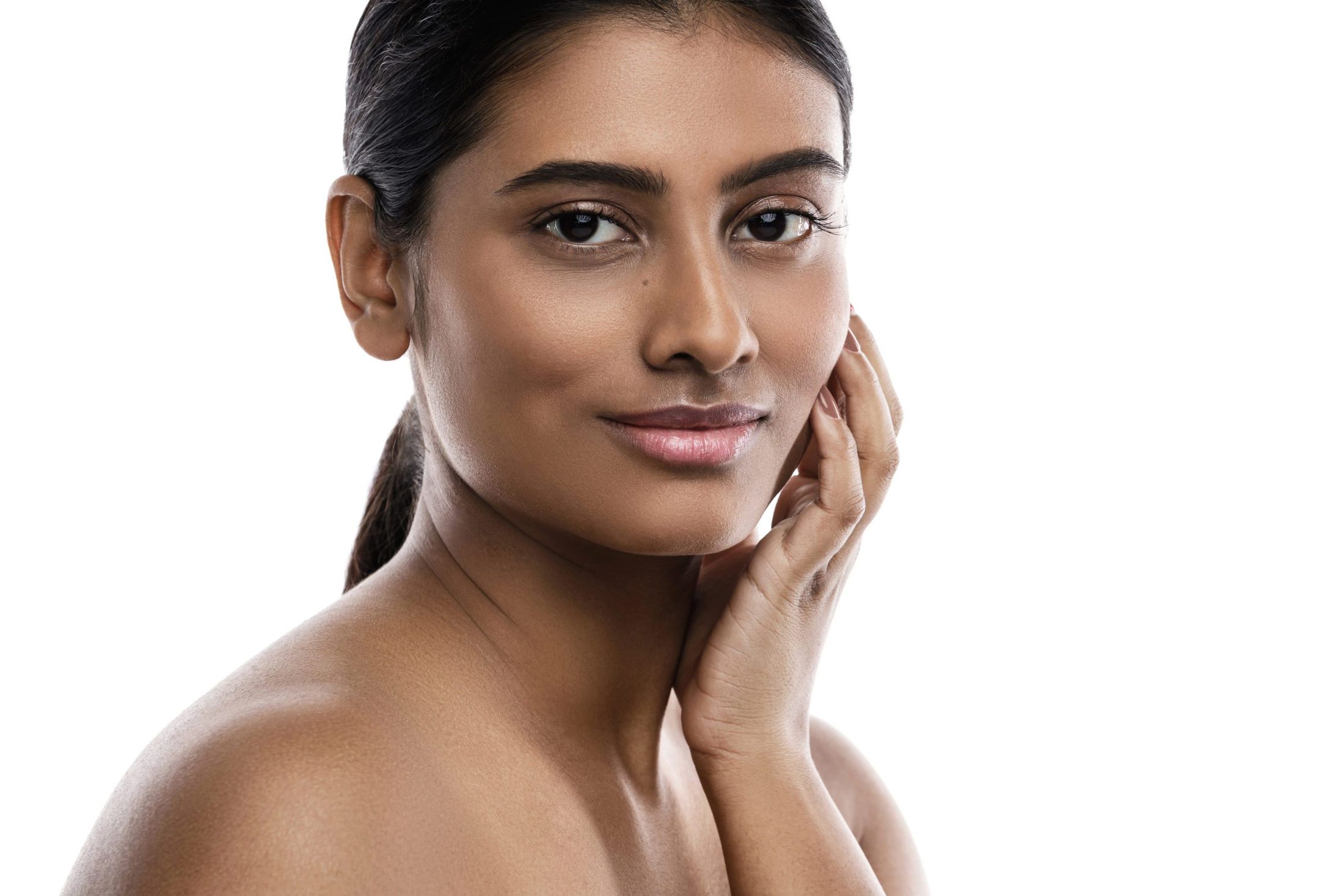 Portrait of young and beautiful Indian woman isolated on white background