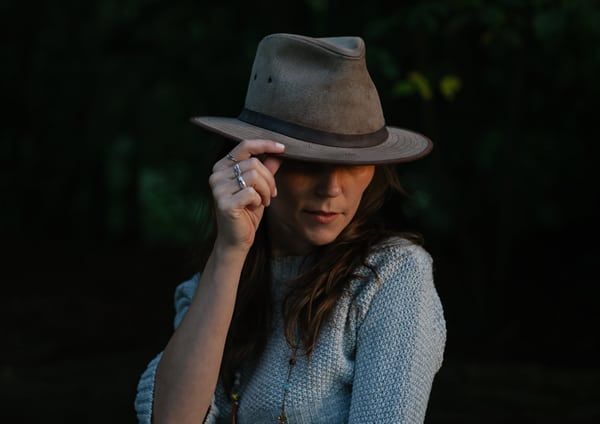 portrait of woman in fedora