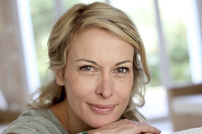 woman sitting on couch