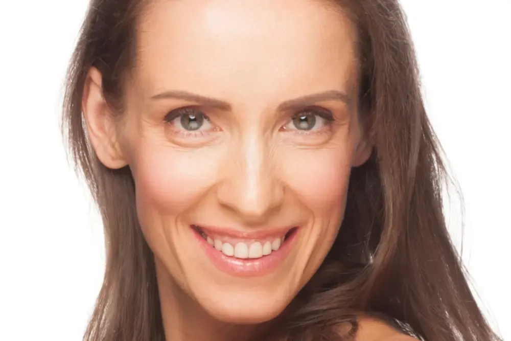 Athre University logo with woman closing her eyes